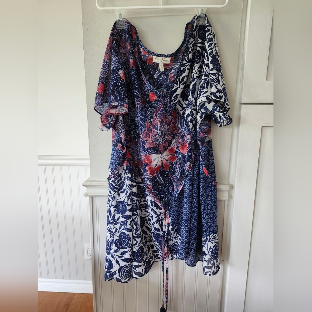 Jessica Simpson Maternity Multicolored floral blouse with uneven hemlineV-neck